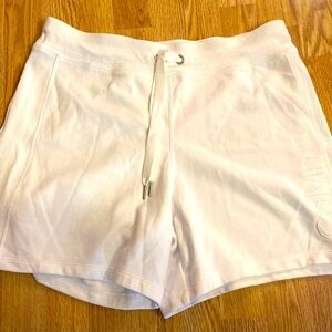 Very blousy Calvin Klein white cloth shorts. Size large